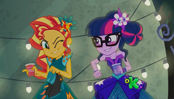 Size: 1920x1090 | Tagged: safe, screencap, sci-twi, sunset shimmer, twilight sparkle, equestria girls, g4, my little pony equestria girls: legend of everfree, alternate hairstyle, blushing, clothes, discovery kids, dress, duo, duo female, female, grin, high heels, shoes, smiling