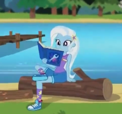 Size: 485x454 | Tagged: safe, screencap, trixie, equestria girls, g4, my little pony equestria girls: legend of everfree, book, clothes, converse, cropped, female, lake, log, reading, shoes, sneakers, solo