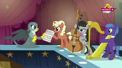 Size: 1280x715 | Tagged: safe, screencap, cantora, gabby, golden tones, octavia melody, parish nandermane, earth pony, griffon, pony, unicorn, g4, the fault in our cutie marks, cello, female, harp, male, mare, minimini, musical instrument, pencil, sheet music, stage, stallion