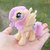 Size: 1500x1500 | Tagged: safe, artist:some-dreamer, fluttershy, g4, beads, hand, irl, offscreen human, photo