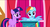 Size: 1360x730 | Tagged: safe, screencap, rainbow dash, twilight sparkle, pegasus, pony, unicorn, applebuck season, g4, duo, female, mare, raised eyebrow, smiling, spread wings, town hall, unicorn twilight