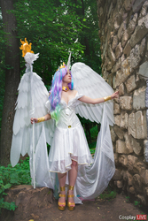 Size: 853x1280 | Tagged: safe, artist:fox-tsai-sheng, princess celestia, human, g4, clothes, cosplay, costume, forest, irl, irl human, photo, solo, spread wings, staff, wall
