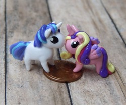 Size: 620x517 | Tagged: safe, artist:vivalahill, princess cadance, shining armor, pony, g4, chibi, irl, male, penny, photo, sculpture, ship:shiningcadance, shipping, straight, tiny ponies, traditional art