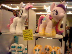 Size: 640x480 | Tagged: safe, princess cadance, sweetie belle, g4, booth, botcon, convention, female, irl, photo, plushie, tailgate, transformers