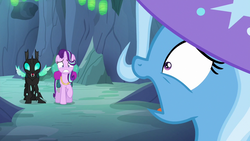 Size: 1280x720 | Tagged: safe, screencap, starlight glimmer, thorax, trixie, changeling, pony, unicorn, g4, to where and back again, clothes, hat, trixie's hat, varying degrees of want