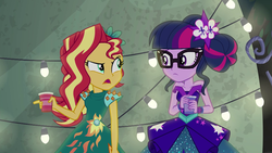 Size: 1280x720 | Tagged: safe, screencap, sci-twi, sunset shimmer, twilight sparkle, equestria girls, g4, my little pony equestria girls: legend of everfree, clothes, crystal gala, cup, drink, lights, open mouth, outdoors