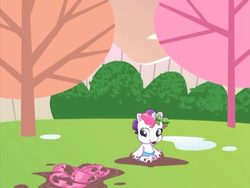Size: 640x480 | Tagged: safe, screencap, sweetie belle (g3), pony, g3, g3.5, newborn cuties, once upon a my little pony time, over two rainbows, bow, clothes, diaper, female, g3.75, looking down, mud, muddy, open mouth, remake, remastered, scarf, solo