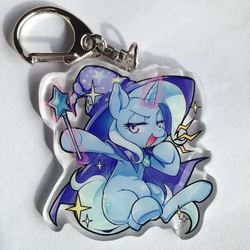 Size: 712x712 | Tagged: safe, artist:mococo, trixie, pony, unicorn, g4, female, keychain, lidded eyes, mare, smug, solo, trixie's cape, trixie's hat