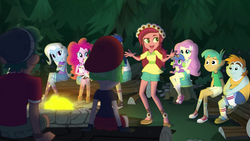 Size: 1280x720 | Tagged: safe, screencap, flash sentry, fluttershy, gloriosa daisy, pinkie pie, snails, snips, spike, spike the regular dog, timber spruce, trixie, watermelody, dog, equestria girls, g4, my little pony equestria girls: legend of everfree, bonfire, camp everfree outfits, converse, female, fire, geode of fauna, geode of shielding, geode of sugar bombs, geode of super speed, geode of super strength, magical geodes, male, shoes
