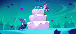 Size: 1296x583 | Tagged: safe, screencap, starlight glimmer, trixie, pony, unicorn, g4, my little pony: the movie, cake, cape, clothes, credits, duo, end credits, eyes closed, female, fireworks, food, giant cake, hat, ladder, mare, pointy ponies, rearing, stepladder, trixie's cape, trixie's hat
