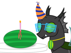 Size: 1067x800 | Tagged: safe, artist:toyminator900, derpibooru exclusive, oc, oc only, oc:éling chang, changeling, candle, changeling loves watermelon, changeling oc, food, glasses, green changeling, hat, medallion, party hat, simple background, smiling, solo, transparent background, watermelon