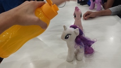 Size: 4128x2322 | Tagged: safe, photographer:horsesplease, pinkie pie, rarity, twilight sparkle, human, g4, bottle, doll, hand, irl, irl human, malaysia, photo, this will not end well, toy, water