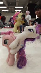 Size: 2322x4128 | Tagged: safe, photographer:horsesplease, fluttershy, pinkie pie, rarity, twilight sparkle, human, g4, irl, malaysia, photo, plushie, ponies riding ponies, rarity riding pinkie pie, riding