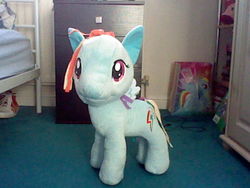 Size: 640x480 | Tagged: safe, rainbow dash, g4, bed, bedroom, irl, photo, plushie, solo