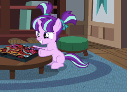 Size: 1236x894 | Tagged: safe, edit, edited screencap, screencap, starlight glimmer, pony, unicorn, season 7, uncommon bond, age regression, animated, blinking, board game, bow, cute, dragon pit, excited, eyes closed, eyes on the prize, female, filly, filly starlight glimmer, gif, glimmerbetes, grin, hoof hold, mine!, motion blur, ouija, ouija board, pigtails, poltergeist, reversed, ribbon, sitting, smiling, solo, squee, underhoof, yoink, younger, zozo