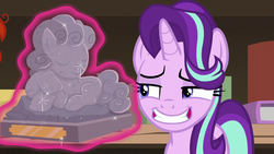 Size: 1280x720 | Tagged: safe, screencap, starlight glimmer, g4, uncommon bond, grin, shit eating grin, smiling, statuette