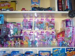 Size: 1032x774 | Tagged: safe, applejack, big macintosh, carrot top, daisy, derpy hooves, fizzypop, flower wishes, fluttershy, gilda, golden harvest, granny smith, lily blossom, lyra heartstrings, minty, misty fly, pinkie pie, princess cadance, rainbow dash, rarity, roseluck, shining armor, sugar grape, sweetie swirl, sweetsong (g4), twilight sparkle, griffon, g4, collection, hot wheels, irl, mane six, mcdonald's, photo, toy