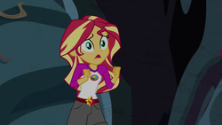 Size: 1280x720 | Tagged: safe, screencap, sunset shimmer, equestria girls, g4, my little pony equestria girls: legend of everfree, camp everfree outfits, cave, clothes, female, open mouth, shorts, solo