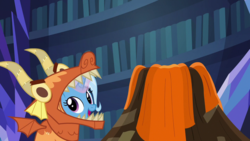 Size: 640x360 | Tagged: safe, screencap, trixie, pony, unicorn, g4, uncommon bond, clothes, costume, cute, dragon costume, female, glowing horn, horn, mare, open mouth, smiling, solo