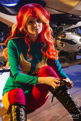 Size: 2667x4000 | Tagged: safe, artist:sunny-tooi, photographer:duginpv, sunset shimmer, human, equestria girls, g4, my little pony equestria girls: friendship games, clothes, cosplay, costume, female, irl, irl human, motorcross, motorcycle, photo, sitting, solo, tying shoes