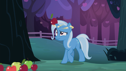 Size: 1646x926 | Tagged: source needed, safe, screencap, trixie, g4, uncommon bond, apple, circling stars, dizzy, female, food, horn, horn guard, horn impalement, solo