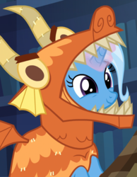 Size: 578x746 | Tagged: safe, screencap, trixie, dragon, pony, unicorn, uncommon bond, adorable face, best dragon, board game, clothes, costume, cropped, cute, daaaaaaaaaaaw, diatrixes, dragon costume, dragon pit, female, glowing horn, hnnng, mare, smiling, solo