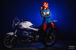 Size: 4000x2667 | Tagged: safe, artist:sunny-tooi, photographer:duginpv, sunset shimmer, human, equestria girls, g4, my little pony equestria girls: friendship games, clothes, cosplay, costume, crossed arms, high res, irl, irl human, motorcross, motorcycle, photo, smiling, solo