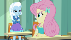 Size: 1280x720 | Tagged: safe, screencap, fluttershy, trixie, a little birdie told me, equestria girls, g4, my little pony equestria girls: better together, female, geode of fauna, magical geodes, smiling, smirk