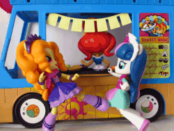 Size: 600x450 | Tagged: safe, artist:whatthehell!?, adagio dazzle, bon bon, sunset shimmer, sweetie drops, equestria girls, g4, my little pony equestria girls: rainbow rocks, action pose, animated, doll, equestria girls minis, fight, food, irl, parody, photo, sunset sushi, sushi, toy, truck