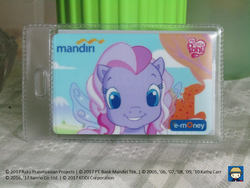 Size: 960x720 | Tagged: safe, starsong, pegasus, pony, g3, g3.5, 2009, bank, bank mandiri, card, e-money, female, filly, indonesia, irl, kids, mandiri, photo, solo, teeth