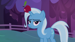 Size: 1920x1080 | Tagged: safe, screencap, trixie, g4, uncommon bond, apple, food, horn, horn guard, horn impalement, looking at you