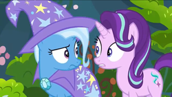 Size: 1136x640 | Tagged: safe, screencap, starlight glimmer, trixie, pony, unicorn, g4, to change a changeling, cape, clothes, confused, hat, looking at each other, shocked, trixie's cape, trixie's hat