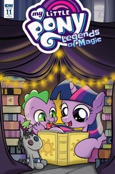 Size: 1054x1600 | Tagged: safe, artist:dsana, idw, smarty pants, spike, twilight sparkle, dragon, pony, unicorn, g4, legends of magic #11, my little pony: legends of magic, spoiler:comic, :t, book, cover, cute, eating, female, filly, filly twilight sparkle, gem, mare in the moon, moon, open mouth, prone, reading, ruby, smiling, tent, younger