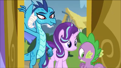 Size: 1136x640 | Tagged: safe, screencap, princess ember, spike, starlight glimmer, dragon, g4, triple threat, looking back, nervous, smiling