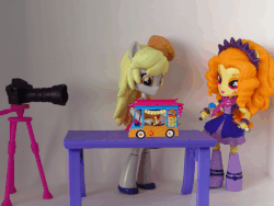 Size: 698x524 | Tagged: safe, artist:whatthehell!?, adagio dazzle, derpy hooves, flash sentry, sunset shimmer, equestria girls, g4, animated, boots, camera, clothes, cute, derpabetes, doll, equestria girls minis, filming, food, irl, jewelry, meta, muffin, photo, shoes, stop motion, sunset sushi, table, toy, tripod, truck