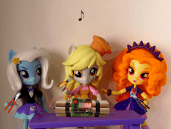 Size: 640x480 | Tagged: safe, artist:whatthehell!?, edit, adagio dazzle, derpy hooves, trixie, equestria girls, g4, animated, bomb, clothes, doll, equestria girls minis, explosives, food, irl, muffin, music, parody, photo, pliers, skirt, toy, tweezers, weapon