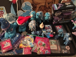 Size: 3264x2448 | Tagged: safe, artist:judhudson, artist:ramivic, enterplay, trixie, g4, blind bag, card game, diecut, funko, funko mystery minis, funrise, hasbro, high res, id card, irl, magazine toy, merchandise, metallic, multeity, photo, plushie, prototype, pyrography, toy, traditional art, trixie army, trixie day, woodwork
