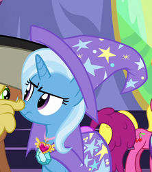 Size: 628x706 | Tagged: safe, screencap, berry punch, berryshine, cherry berry, discord, meadow song, trixie, earth pony, pony, celestial advice, g4, cape, clothes, hat, solo focus, trixie is not amused, trixie's cape, trixie's hat, unamused