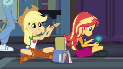 Size: 1426x802 | Tagged: safe, screencap, applejack, sci-twi, sunset shimmer, twilight sparkle, equestria girls, equestria girls series, g4, the finals countdown, book, silly, tongue out, video game