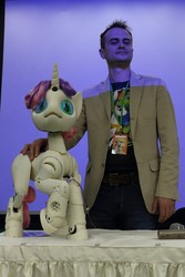 Size: 912x1368 | Tagged: safe, sweetie belle, human, pony, robot, robot pony, sweetie bot project, g4, 2017, defictionalization, derpfest, irl, irl human, photo, proto3, sweetie bot