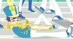Size: 533x304 | Tagged: safe, screencap, woody winds, a queen of clubs, equestria girls, g4, my little pony equestria girls: better together, background human, clothes, cropped, hat, male, musical instrument, pants, shoes, trombone