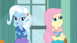 Size: 1920x1080 | Tagged: safe, screencap, fluttershy, trixie, a little birdie told me, equestria girls, g4, my little pony equestria girls: better together, canterlot high, crossed arms, duo, female, fluttershy is not amused, frown, raised eyebrow, talking, unamused