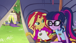 Size: 1280x720 | Tagged: safe, screencap, sci-twi, sunset shimmer, twilight sparkle, equestria girls, g4, my little pony equestria girls: legend of everfree, belt, camp everfree outfits, camper, clothes, duo, glasses, scenery, shorts, tent