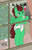 Size: 1896x3000 | Tagged: safe, alternate version, artist:uniamoon, oc, oc only, oc:northern haste, deer, reindeer, anthro, unguligrade anthro, blushing, christmas, christmas lights, christmas tree, cookie, diaper, food, holiday, milk, santa claus, solo, toddler, tree, window, ych result