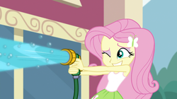 Size: 1912x1072 | Tagged: safe, screencap, fluttershy, equestria girls, equestria girls specials, g4, my little pony equestria girls: dance magic, female, hose, one eye closed, solo, this will end in wet tshirts