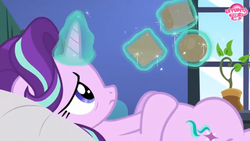 Size: 2208x1242 | Tagged: safe, screencap, starlight glimmer, pony, unicorn, every little thing she does, g4, bed, blocks, cube, female, glowing horn, horn, levitation, magic, magic aura, mare, octahedron, on bed, potted plant, sad, solo, sphere, telekinesis