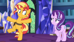 Size: 1152x648 | Tagged: safe, screencap, starlight glimmer, sunset shimmer, pony, unicorn, equestria girls, equestria girls specials, g4, my little pony equestria girls: mirror magic, balancing, belt, bipedal, book, cropped, cute, female, flailing, frown, in the human world for too long, looking over shoulder, mare, saddle bag, stare, twilight's castle, twilight's castle library