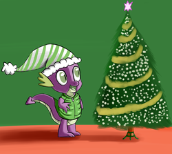 Size: 881x785 | Tagged: safe, artist:itsthinking, idw, spike, dragon, g4, christmas, christmas tree, clothes, green background, hat, hearth's warming eve, holiday, jacket, male, open mouth, santa hat, simple background, smiling, solo, tree