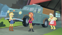 Size: 1366x768 | Tagged: safe, screencap, applejack, granny smith, sunset shimmer, driving miss shimmer, driving miss shimmer: applejack, equestria girls, g4, my little pony equestria girls: better together, apple-jack, clothes, female, super strength, trio, truck