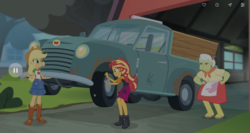 Size: 1366x725 | Tagged: safe, screencap, applejack, granny smith, sunset shimmer, driving miss shimmer, equestria girls, equestria girls series, g4, apple-jack, clothes, driving miss shimmer: applejack, super strength, truck